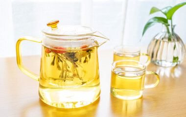 Herbal health tea brewed on the table