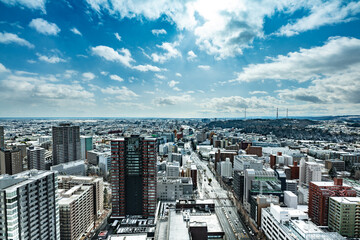 Obraz premium 日本 雪化粧の市街風景