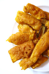 Indian food raw banana bajji or fritter, which is a traditional and popular dish.