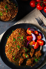 Buckwheat groats baked in the oven with beef goulash