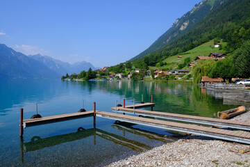 Fototapeta na wymiar Brienzersee Lake and jetty at Oberreid, Berner Oberland, Switzerland