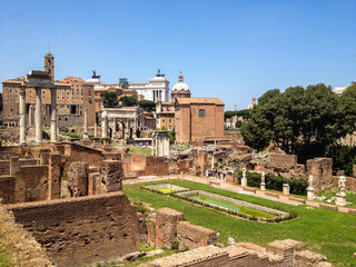 Ruins of old Rome with many historical buildings and temples.