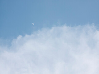 soft white clouds on blue sky background.