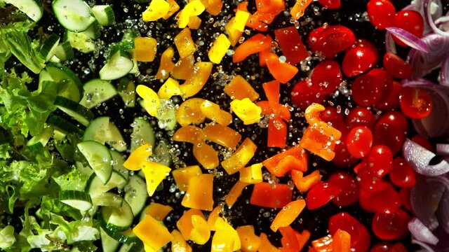 Super slow motion of various vegetable exploding up in the air. Filmed on high speed cinema camera, 1000 fps.