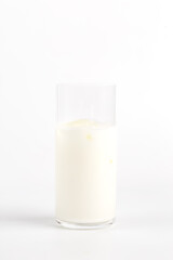 glass of milk on a white background