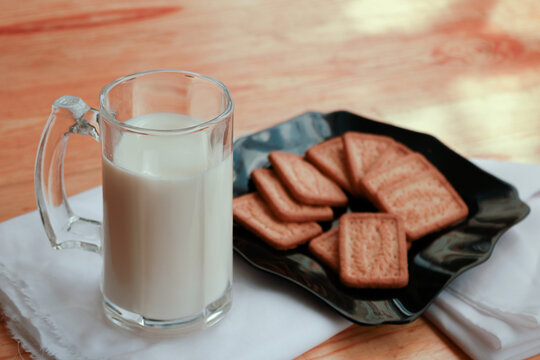 Delicious breakfast with milk and coconut biscuit