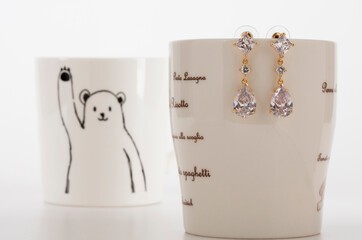 Close up of diamond earrings. space for your text.