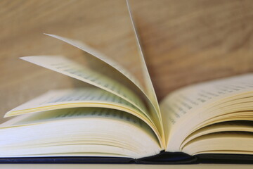 Close-up of books open on the library desk selective focus and shallow depth of field