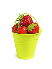 Ripe strawberries in miniature yellow metal bucket isolated on white background