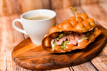 cup coffee and sandwich with tuna