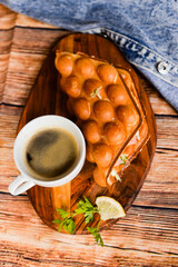 cup coffee and sandwich with tuna