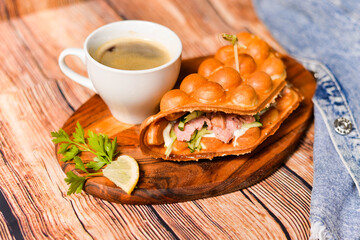 cup coffee and sandwich with tuna