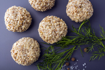 Recipe of cooking vegetarian buckwheat cutlets or meatballs. Raw formed buckwheat meatballs. Homemade food concept. Сlose up