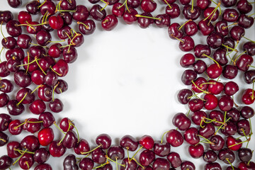 Sweet Cherries against a white background with a place for an inscription