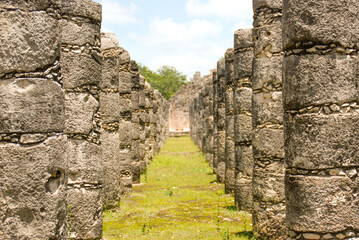 Fototapeta na wymiar Ancient mayan colums in Chichen Itza, Yucatan, Mexico