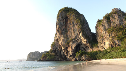 Phra Nang Beach with rocky peaks in the ocean at Railay, Thailand.