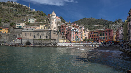 Vernazza, 4th village in row (from Riomaggiore) of 5 old medieval towns of Cinque Terre on Ligurian coast, view of Vernazza small harbor & marina from trail to Monterosso, La Specia, Liguria, Italy.