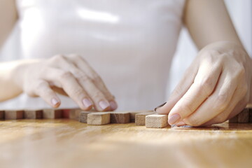 Obraz premium woman using a hand to block the wood