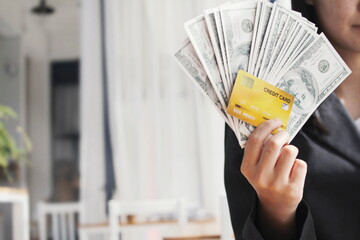 woman holding euro banknotes