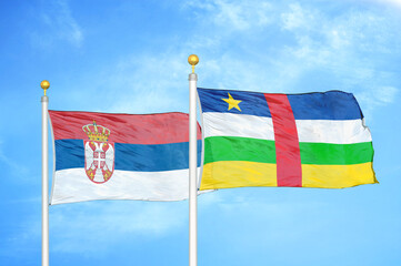 Serbia and Central African Republic two flags on flagpoles and blue sky