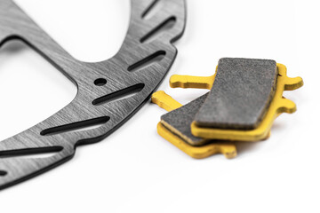 mountain bike, disk and pads brake on the white background, closeup © prima91