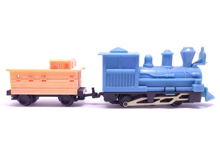 Toy train isolated on white background. Concept of childhood learning. Selective focus.