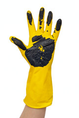 Yellow latex glove black mud five fingers open palm on a white background