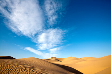 Fototapeta na wymiar Approaching sunset under desert skies