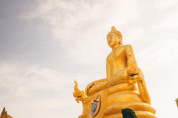 Gold statue of Buddha in Phuket, Thailand