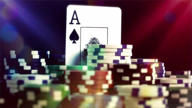Ace of spades and Poker Chips rotating on black background with show lights. Seamlesly loop