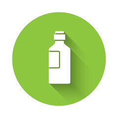 White Bottle of water icon isolated with long shadow. Soda aqua drink sign. Green circle button. Vector Illustration.