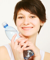 woman with bottle of clean water