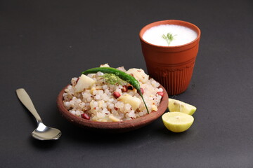Sabudana Khichadi - An authentic dish from Maharashtra made with sago seeds, served with buttermilk.