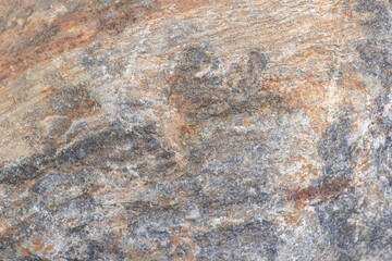gray stone texture with red spots