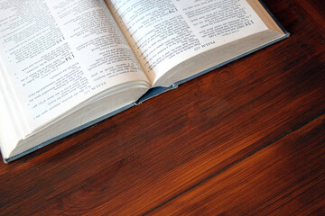 bible  open on table background with copy space for bible study 