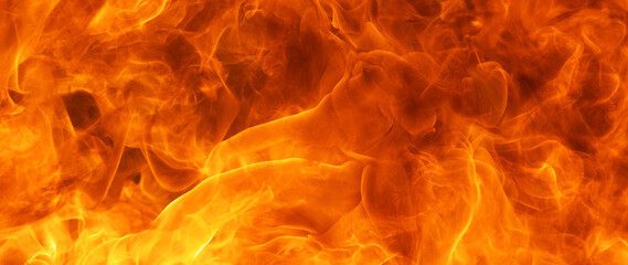 Fototapeta premium blaze fire flame conflagration texture for banner background, 64 x 27 ultra-widescreen aspect ratio