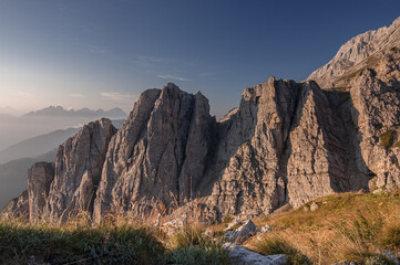 North side of Civetta mountain group as seen from A. Sonino refuge at Coldai, stage eight of Alta Via 1 classic trek in the Dolomites, Zolda Alto municipality, province of Belluno, South Tirol, Italy.