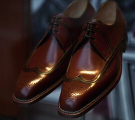 luxury man's shoes in the shop window