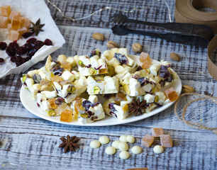 white chocolate fudge with pistachio, cashews, marmalade and dried cranberries