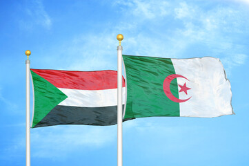 Naklejka na ściany i meble Sudan and Algeria two flags on flagpoles and blue sky