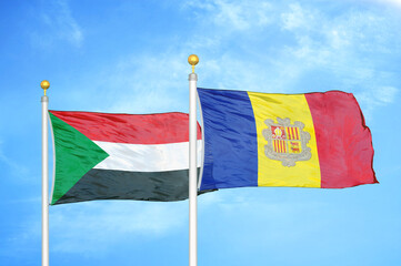 Sudan and Andorra two flags on flagpoles and blue sky