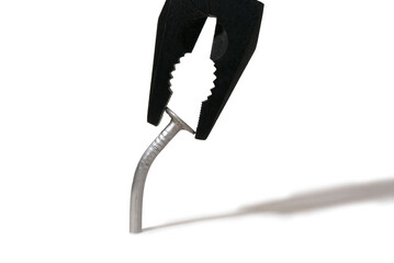 one curve iron nail and pincers on a white background