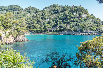 The bay of Paraggi in Portofino with green and transparent water