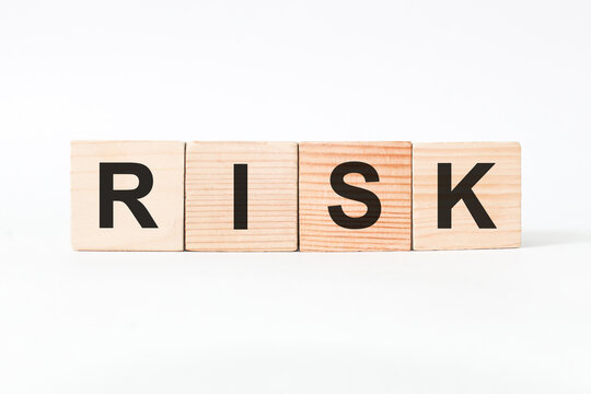 Alphabet block with letters RISK. finance. bisness