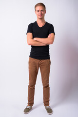 Fototapeta premium Portrait of handsome man against white background
