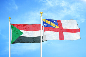 Sudan and Herm two flags on flagpoles and blue sky