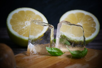 gin and tonic cocktail with clear ice cubes