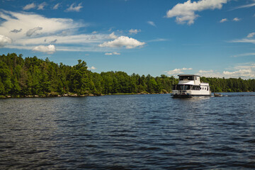 Fototapeta na wymiar Houseboat on Lake Kabetogama in Voyageurs National Park, Minnesota