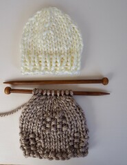 hand knitting for babies on wooden needles 