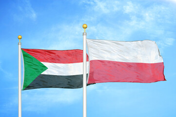 Naklejka na ściany i meble Sudan and Poland two flags on flagpoles and blue sky